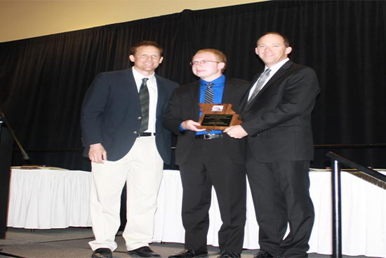 Chris Short receiving Curtis Kerr award