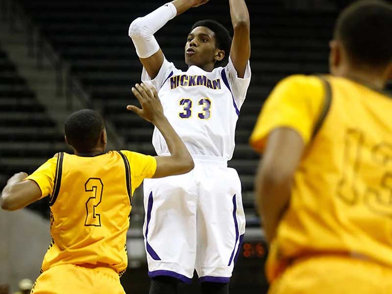 Jimmy Whitt shooting a basket