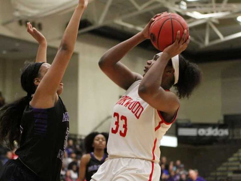 Lauryn Miller shooting a basketball