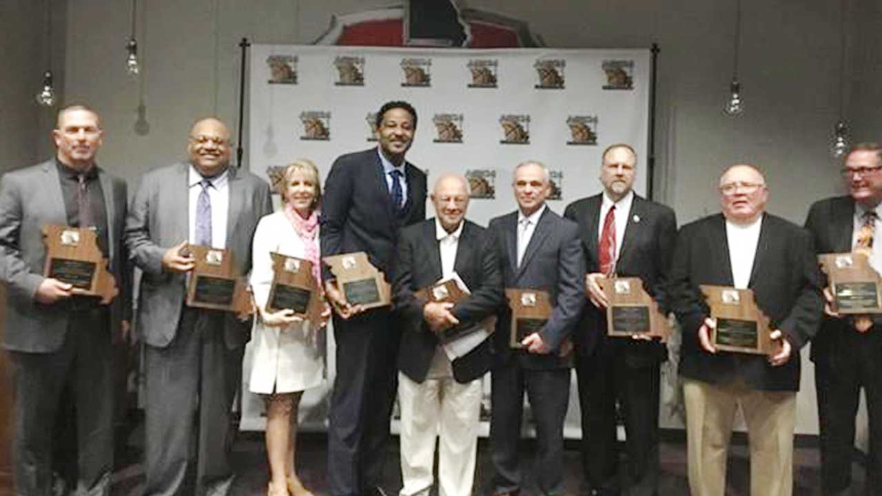 Basketball Coaches receiving awards