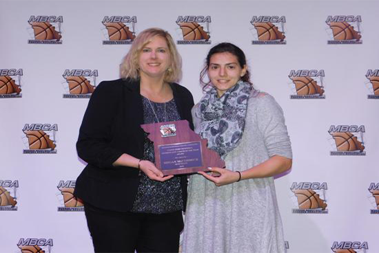 Megan McCormick receiving Curtis Kerr Award